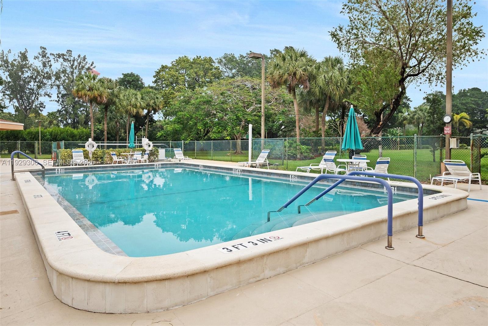 900 St Charles Place, Unit 419 Pembroke Pines, FL 33026 - Photo 26 of 27 a view of a swimming pool with a patio