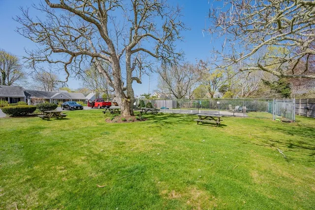 a view of a street with sitting area