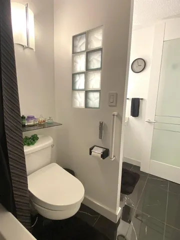 a view of a living room and hardwood floor