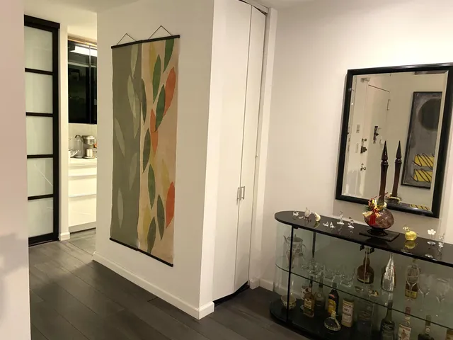 a bathroom with a mirror and a sink