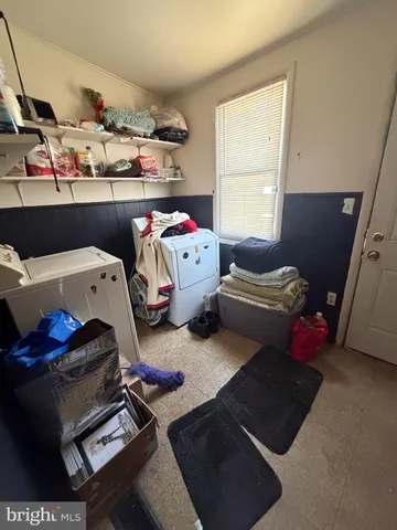 a front view of a house with barbeque area