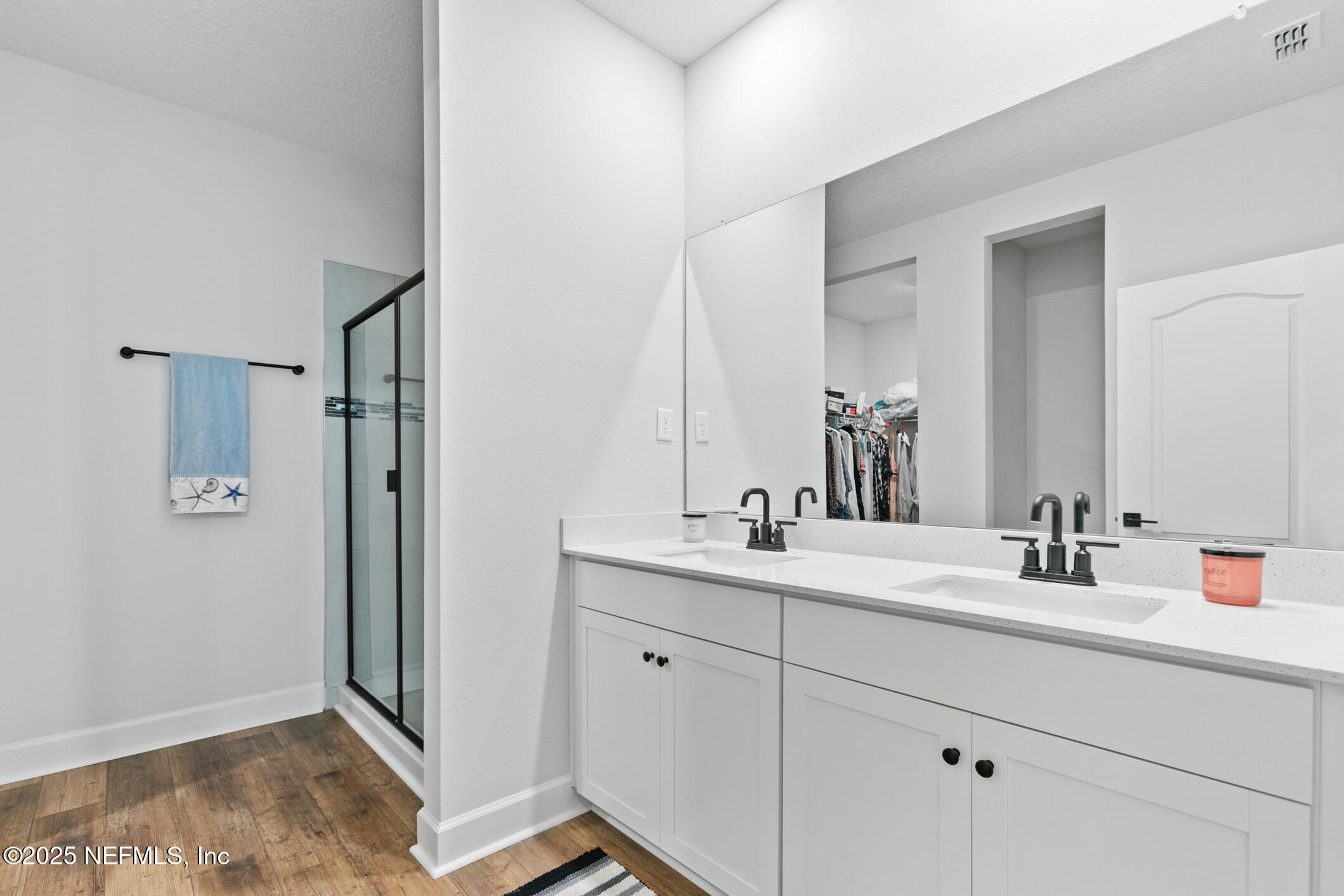 52 Falcon Ridge Road St. Augustine, FL 32084 - Photo 24 of 36 a bathroom with a sink and a mirror
