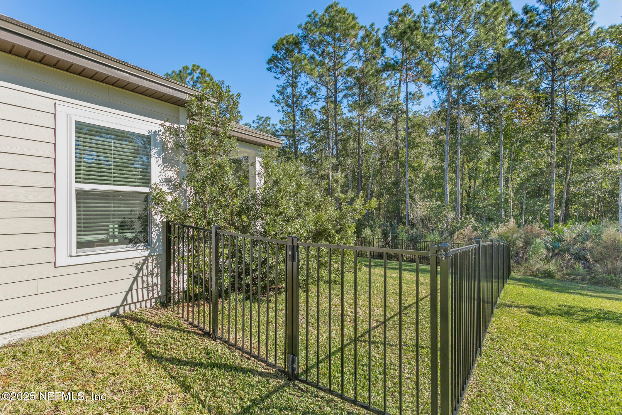 52 Falcon Ridge Road St. Augustine, FL 32084 - Photo 28 of 36 a view of a backyard