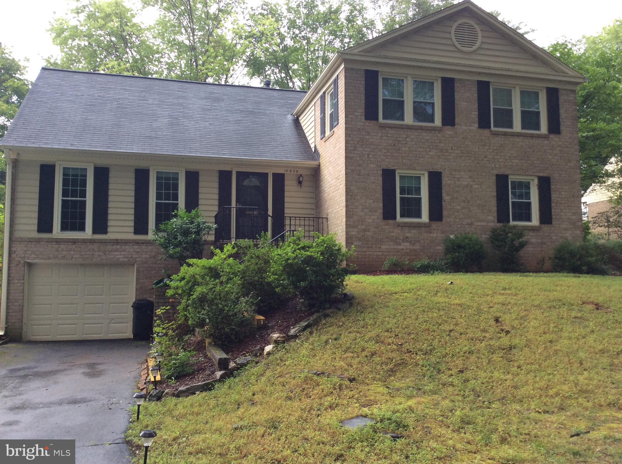 Solid home, mostly brick front