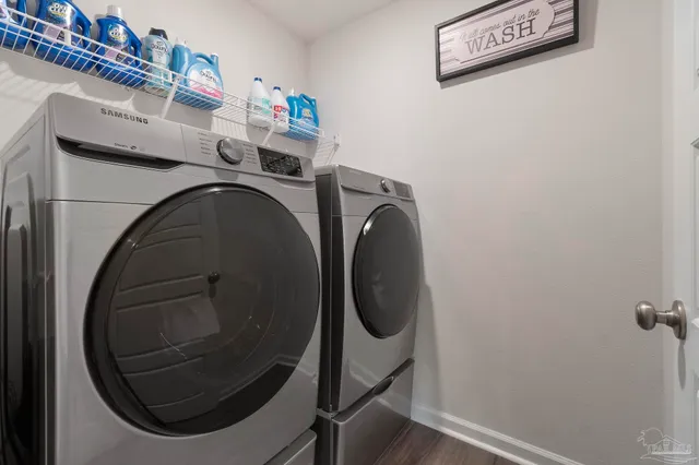 a utility room with dryer and washer