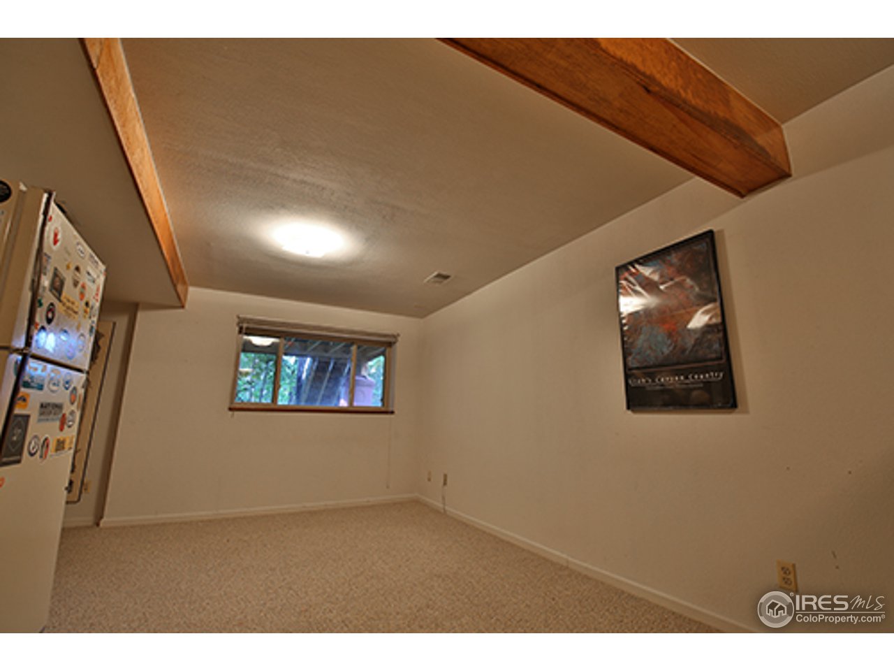 2445 Rim Drive Broomfield, CO 80020 - Photo 12 of 13 a view of a hallway with windows