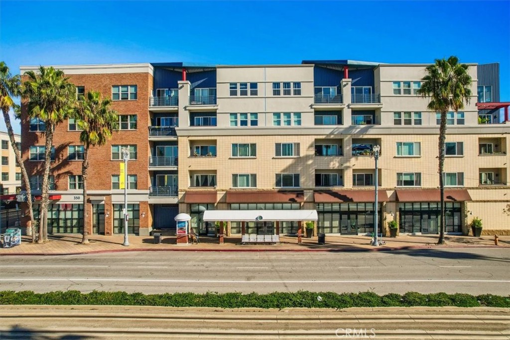 300 East 4th Street, Unit 214 Long Beach, CA 90802 - Photo 2 of 75 a view of a building with a street