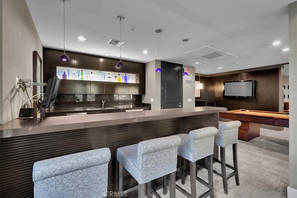 300 East 4th Street, Unit 214 Long Beach, CA 90802 - Photo 73 of 75 Sports Room w/ Bar, Lounge, Pool Table, TV's and Poker Table