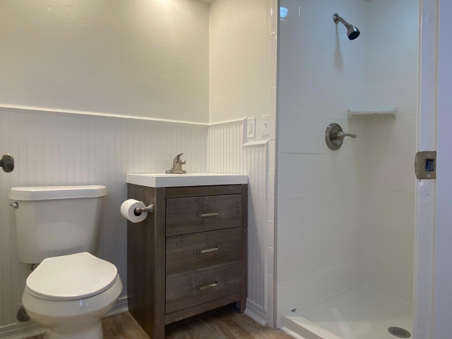3512 23rd Street Lubbock, TX 79410 - Photo 16 of 19 Owners bath with walk-in shower