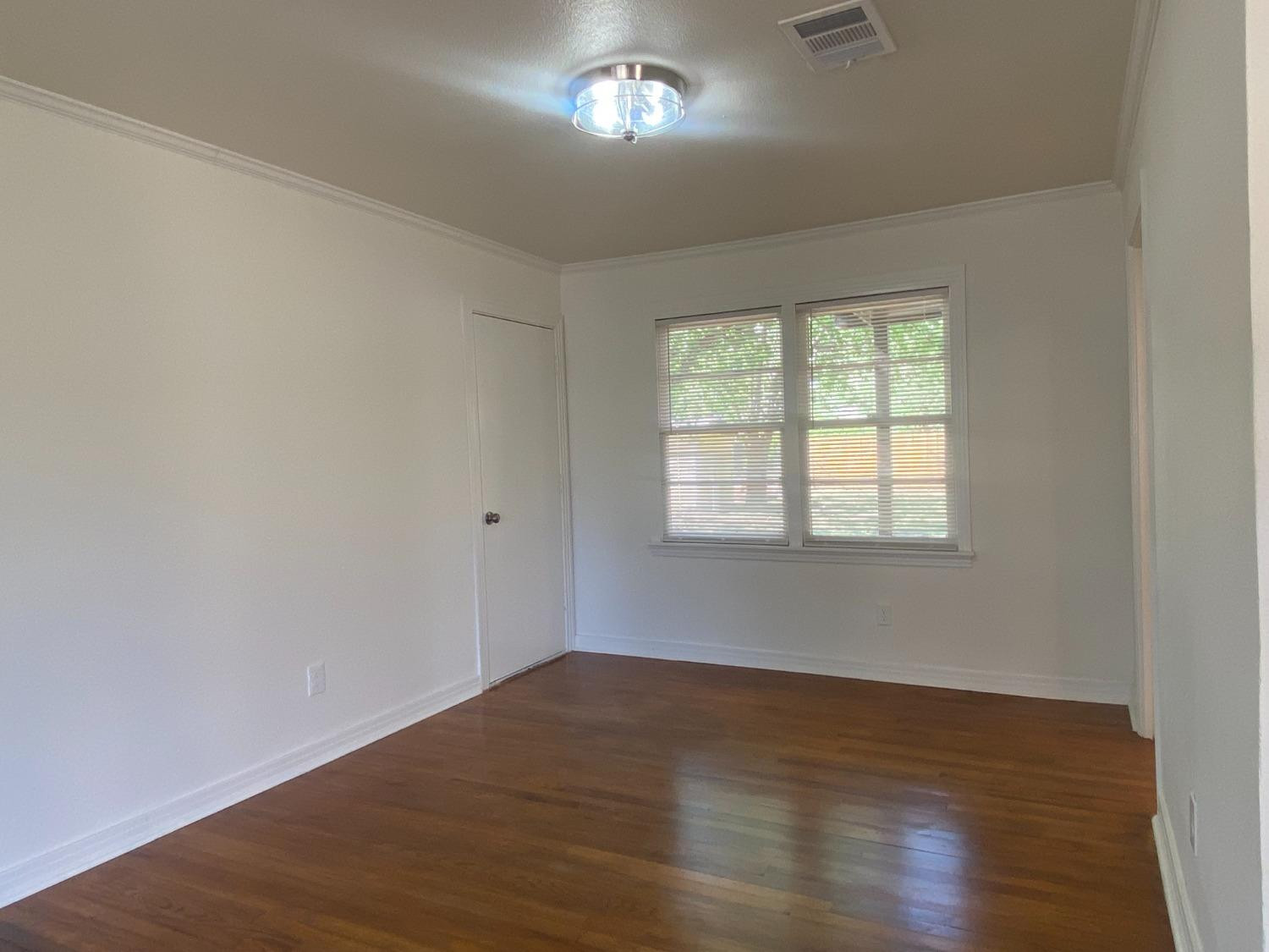3512 23rd Street Lubbock, TX 79410 - Photo 5 of 19 Dining Area with beautiful hardwoods!
