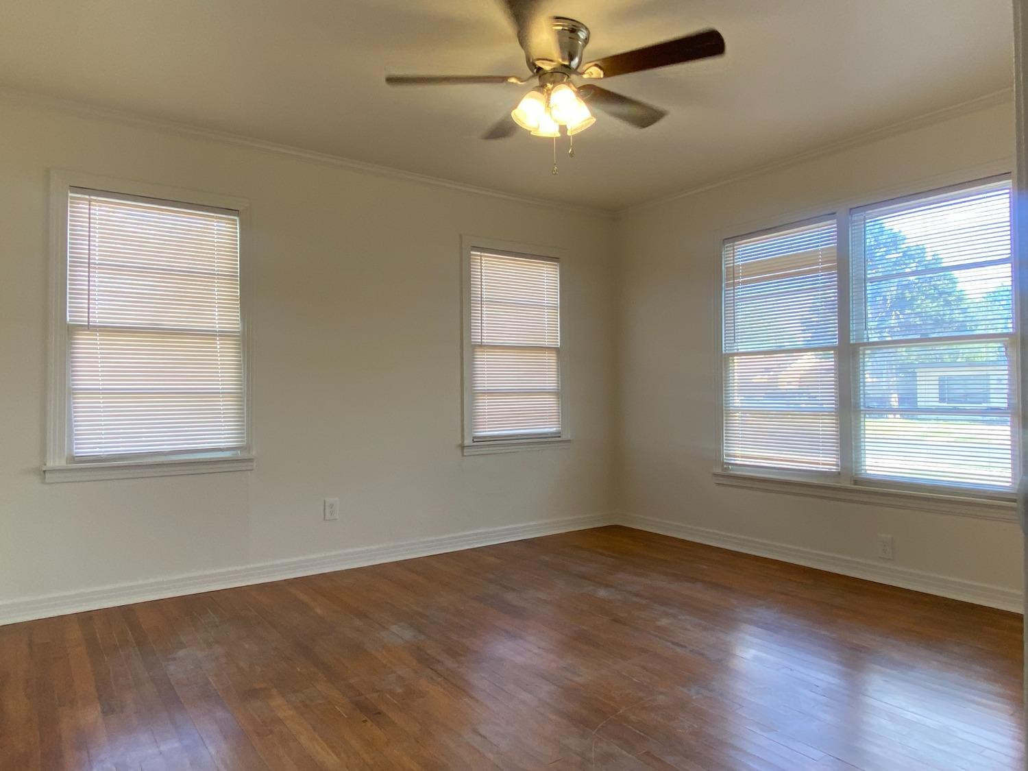 3512 23rd Street Lubbock, TX 79410 - Photo 10 of 19 Spacious bedroom with hardwoods