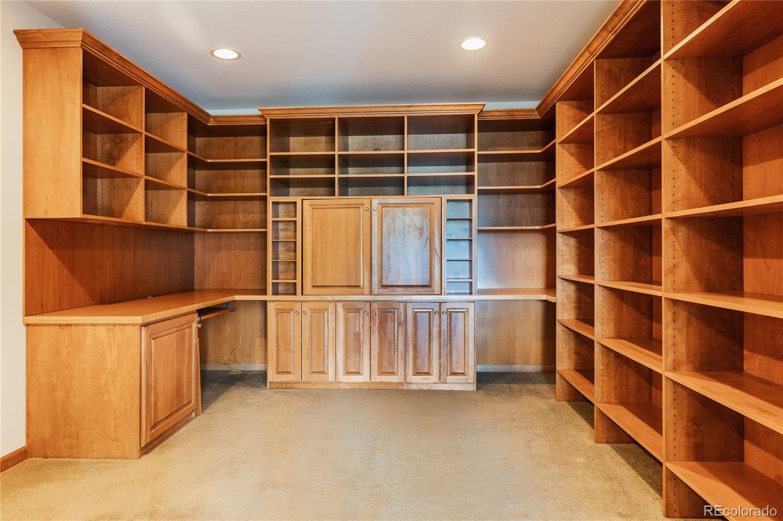 34187 Cactus Drive Evergreen, CO 80439 - Photo 23 of 39 a view of an empty room with cabinet