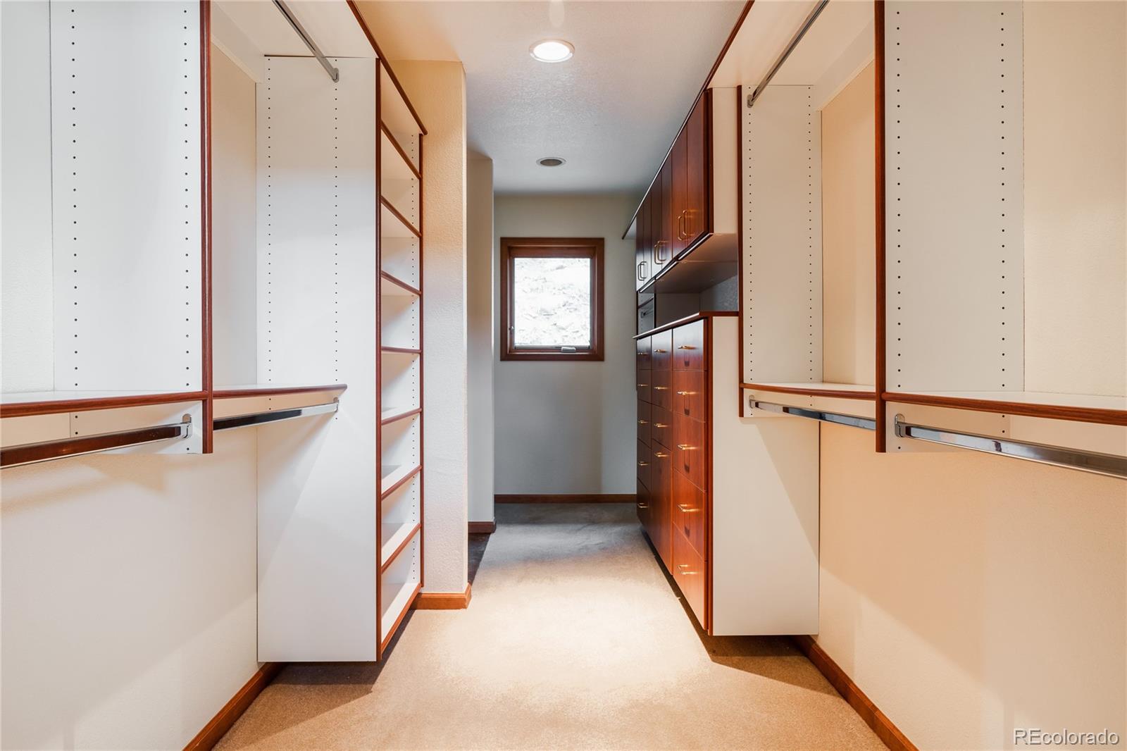 34187 Cactus Drive Evergreen, CO 80439 - Photo 25 of 39 a view of a hallway with a white walls