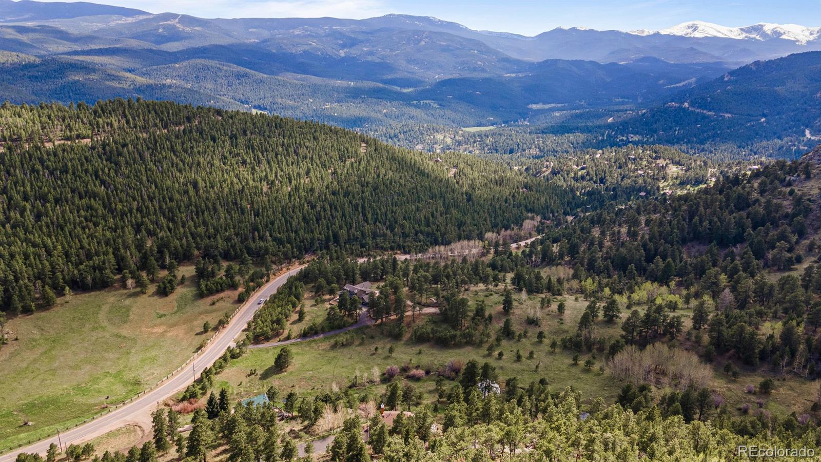 34187 Cactus Drive Evergreen, CO 80439 - Photo 39 of 39 a view of a mountain from a balcony