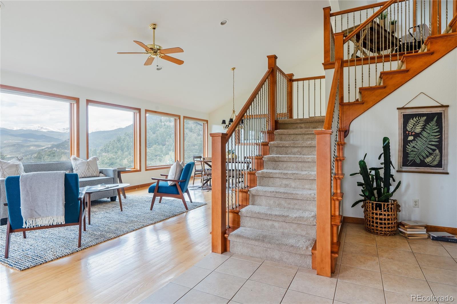 34187 Cactus Drive Evergreen, CO 80439 - Photo 5 of 39 a view of entryway and hall with wooden floor