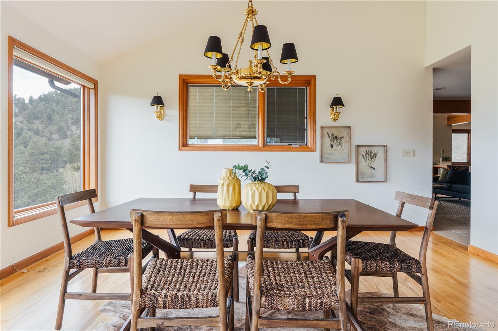 34187 Cactus Drive Evergreen, CO 80439 - Photo 7 of 39 a view of a dining room with furniture and window