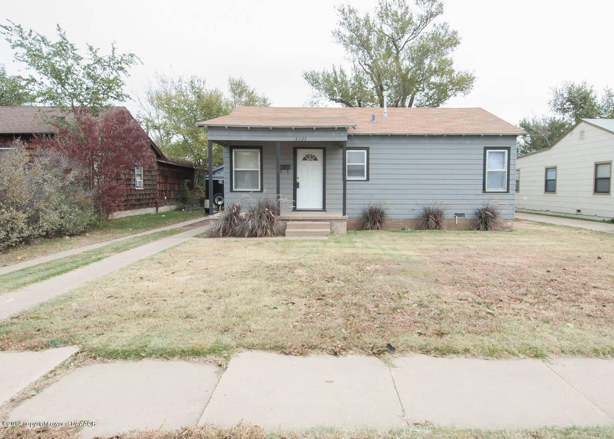 4125 South Ong Street Amarillo, TX 79110 - Photo 1 of 20 a front view of a house with a yard