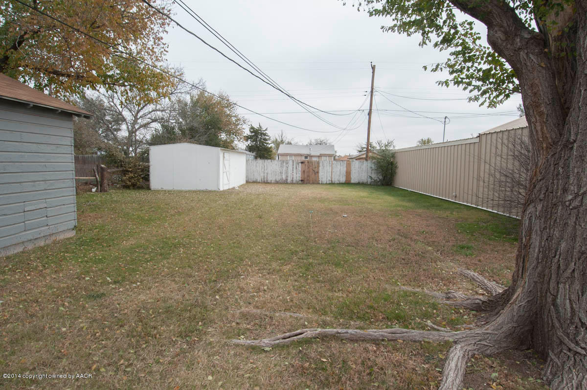 4125 South Ong Street Amarillo, TX 79110 - Photo 20 of 20 a view of a house with a snow in the yard