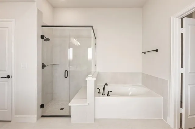 a view of a bathroom with a sink and mirror