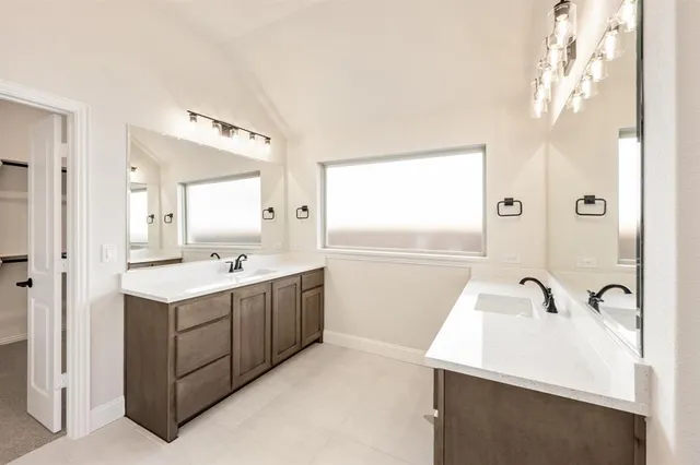 a bathroom with a bathtub and shower