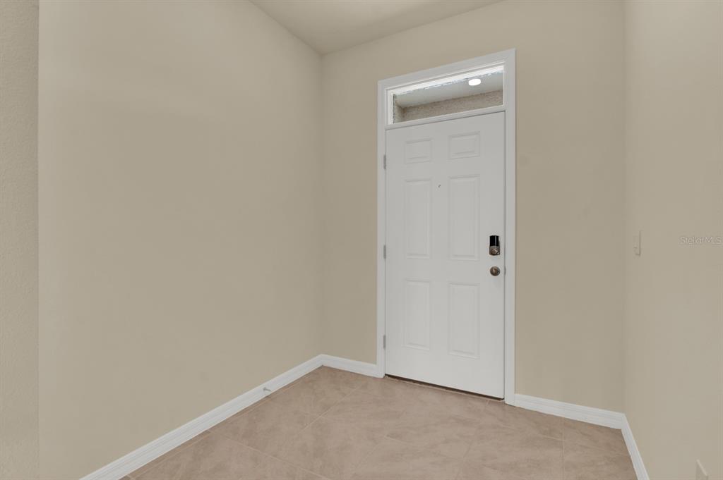 1238 Lido Drive Howey-in-the-Hills, FL 34737 - Photo 4 of 27 a view of an empty room