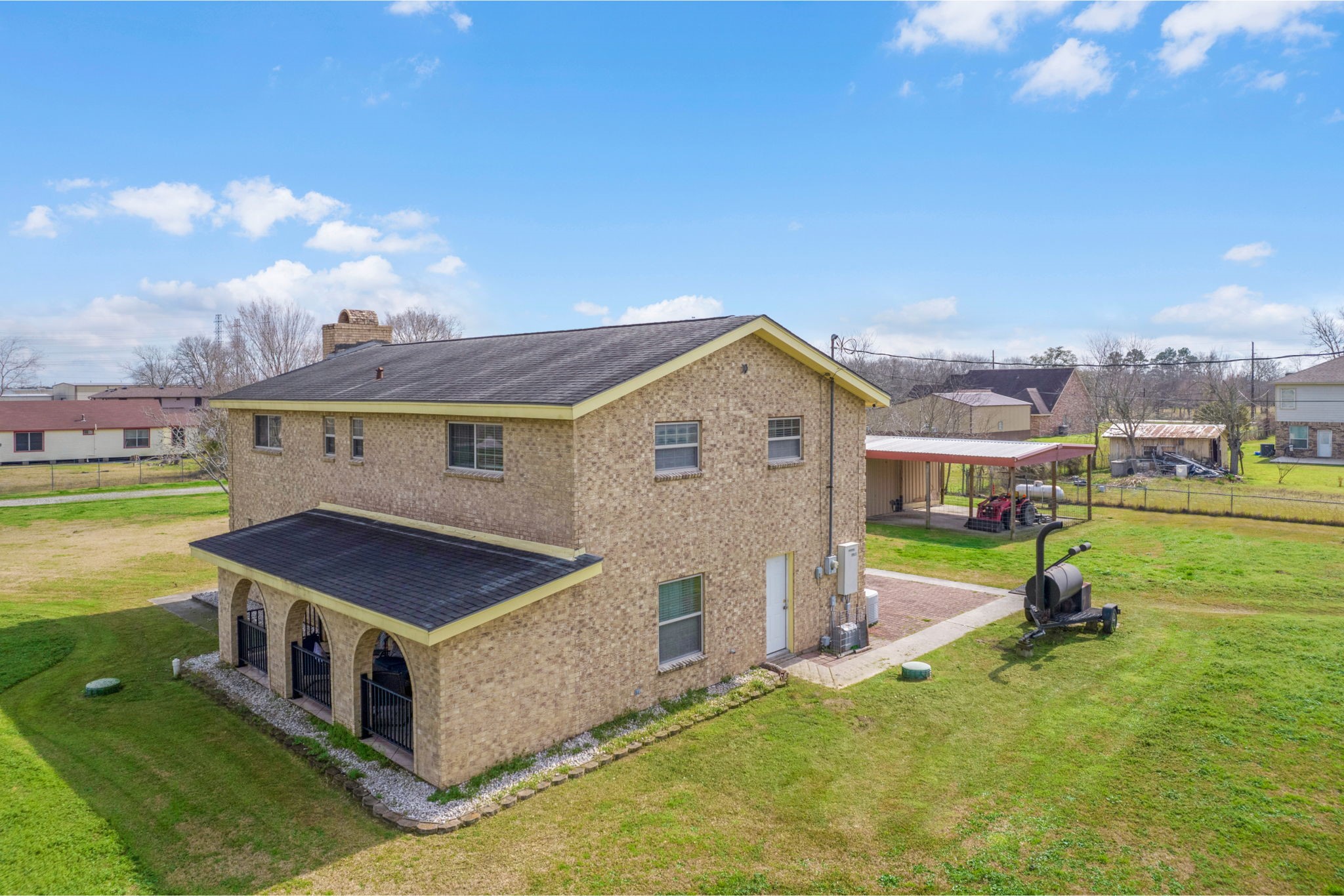 a view of a house with a big yard