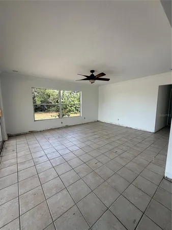 an empty room with windows