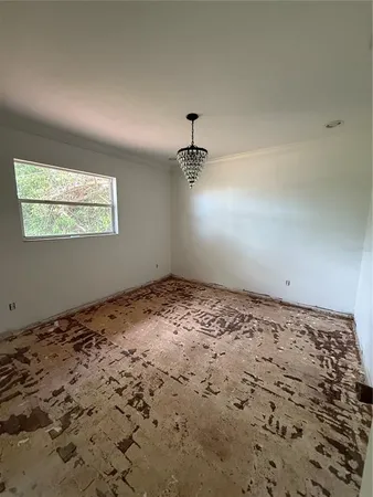 a view of a big room with natural light