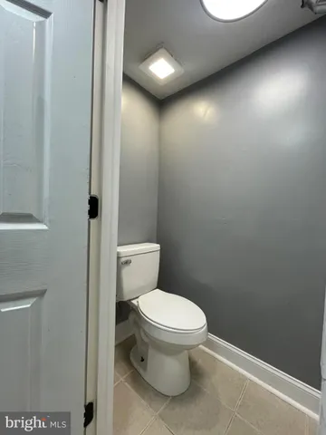 a bathroom with a toilet and a sink