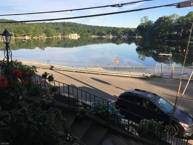 a view of a lake from a balcony