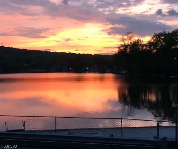 a view of lake from sunset