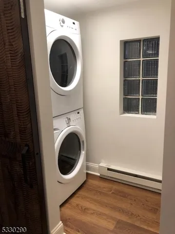 a view of a kitchen with washer and dryer