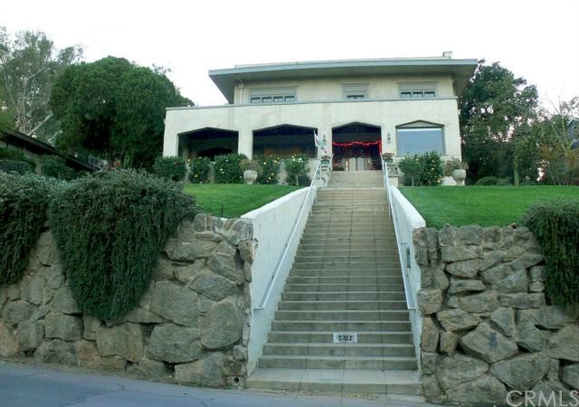 A 1912 "Prairie" style home at 3783 Mt. Rubidoux Drive, Riverside, CA 92501. Between 1893 and 1920, Frank Lloyd Wright transformed the American home when he began to design "Prairie" style houses with low horizontal lines and open interior spaces. The original owner of this home owned the Simms Flower Shop which was located in the Rotunda of the Mission Inn.