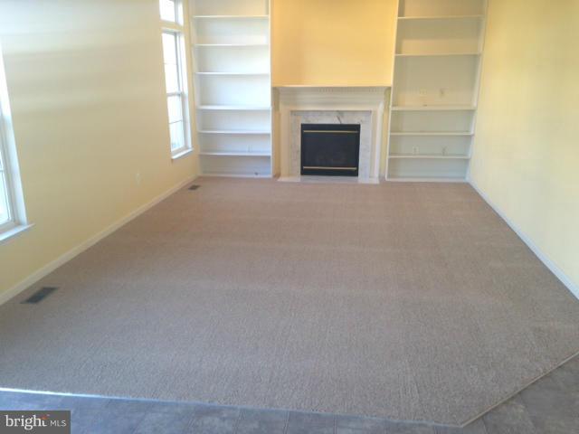 72 Maddex Farm Drive Shepherdstown, WV 25443 - Photo 6 of 20 a view of empty room with a fireplace