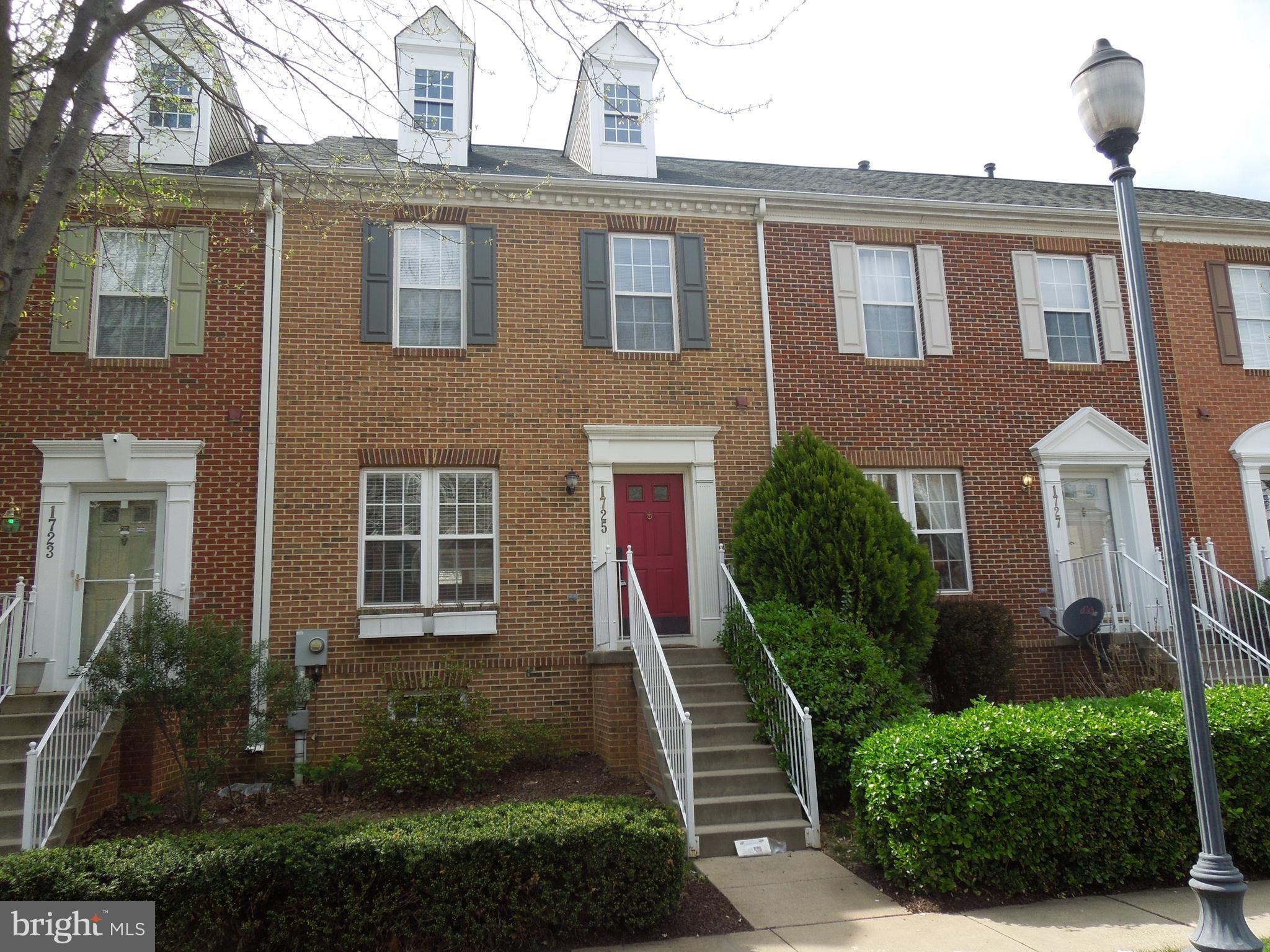 1725 Emory Street Frederick, MD 21701 - Photo 1 of 1 a front view of a house with a yard
