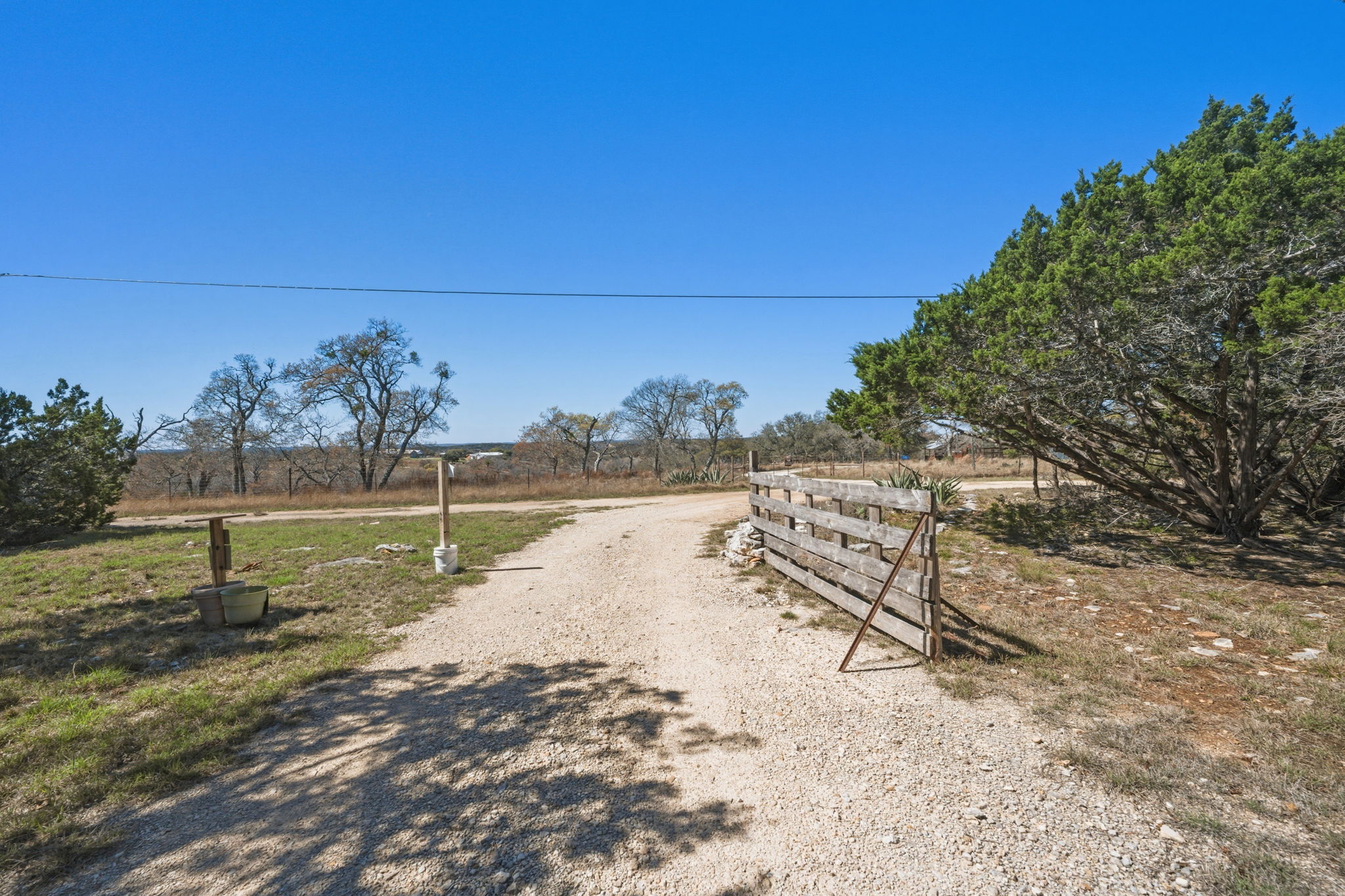 1301 Altwein Road Blanco, TX 78606 - Photo 9 of 40 View of dirt / gravel road with a view of rural / pastoral area