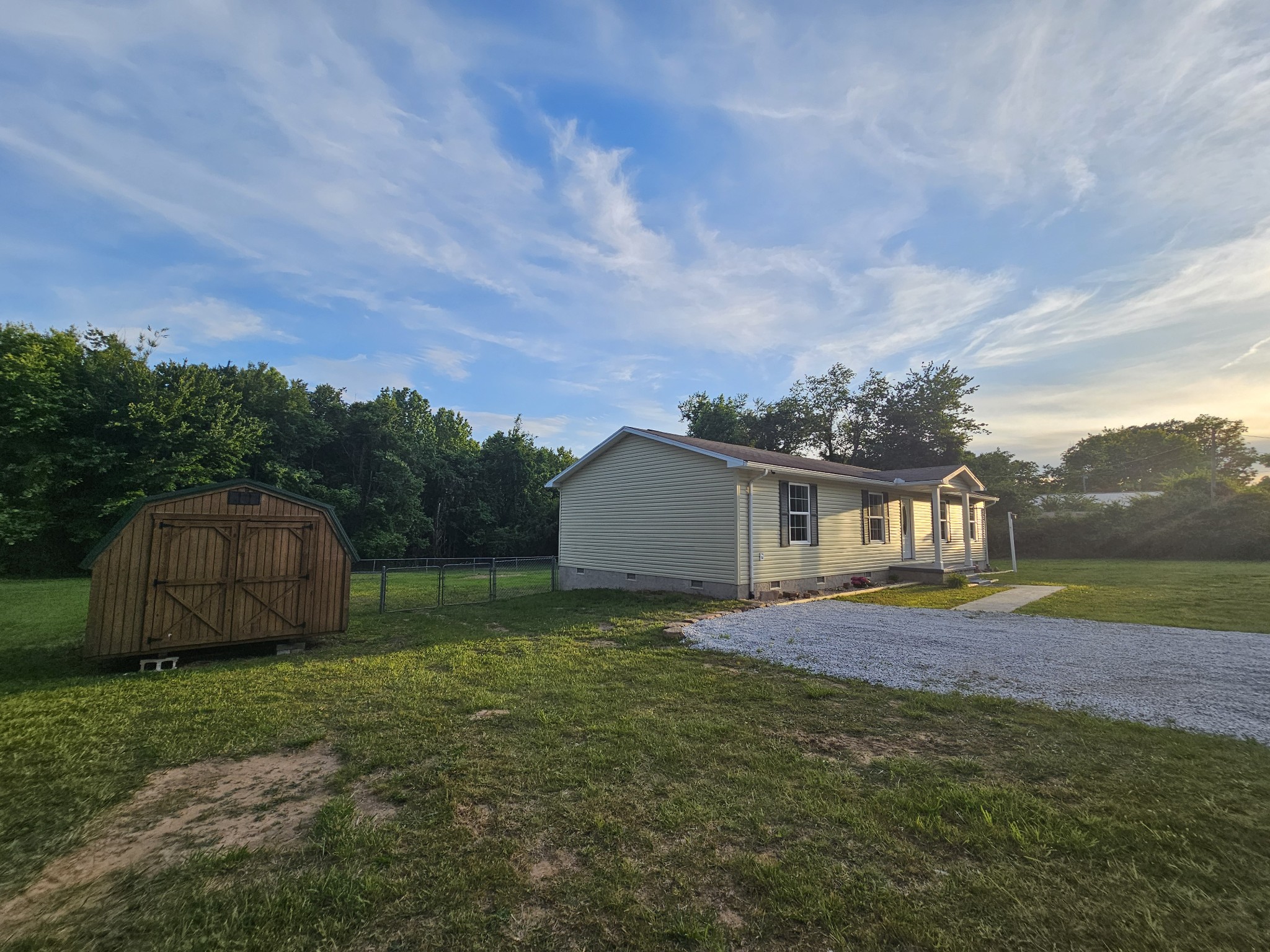 362 Forest Point Road Monteagle, TN 37356 - Photo 4 of 42 a view of a house with a back yard