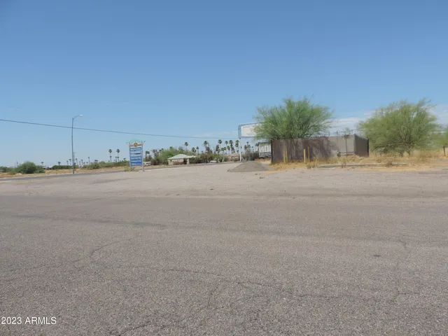 a view of a road and a building in the background