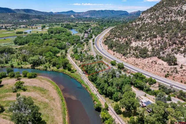a view of a city with a lake