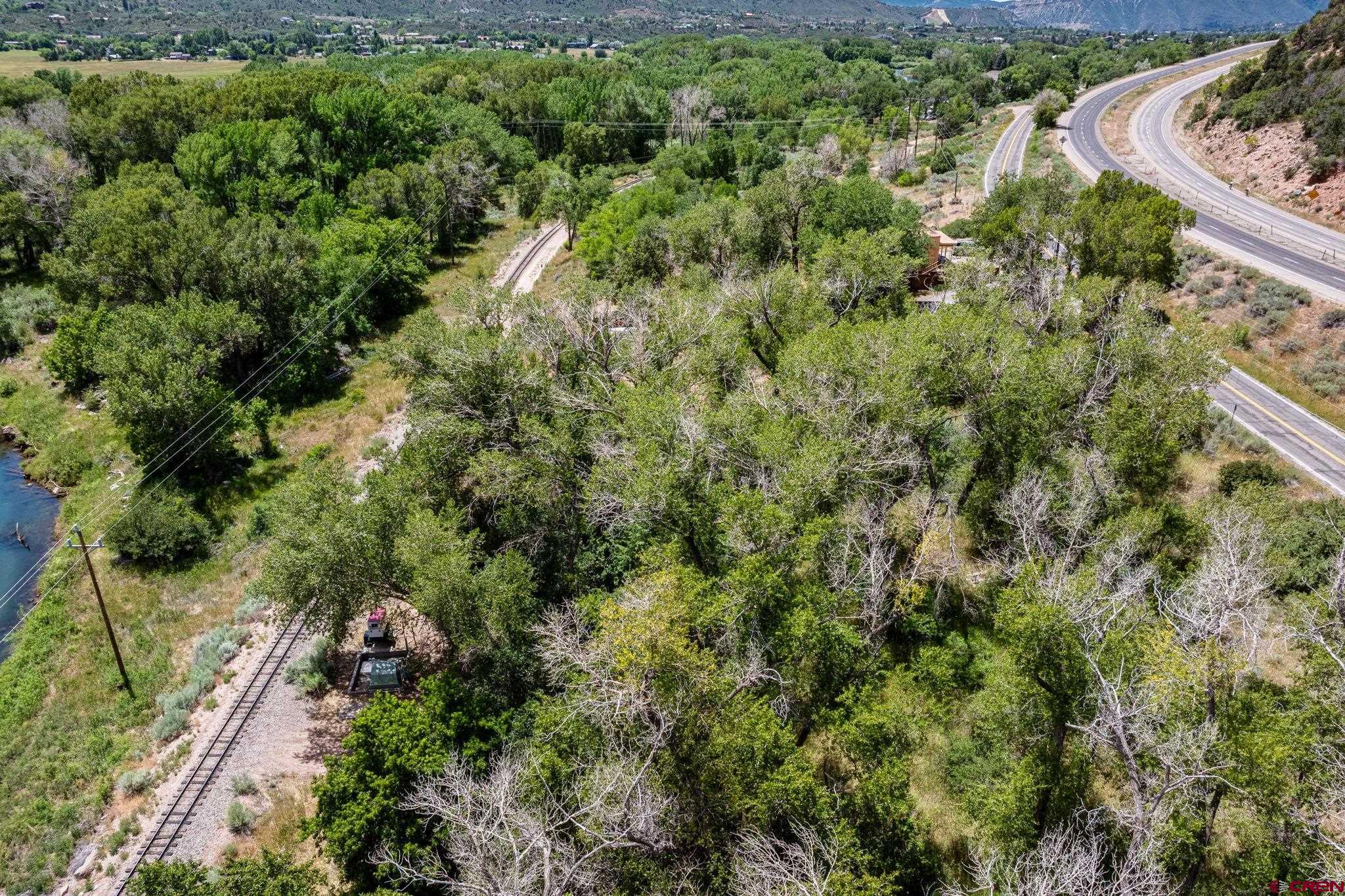 1110 Animas View Drive Durango, CO 81301 - Photo 23 of 32 an aerial view of a house with a yard