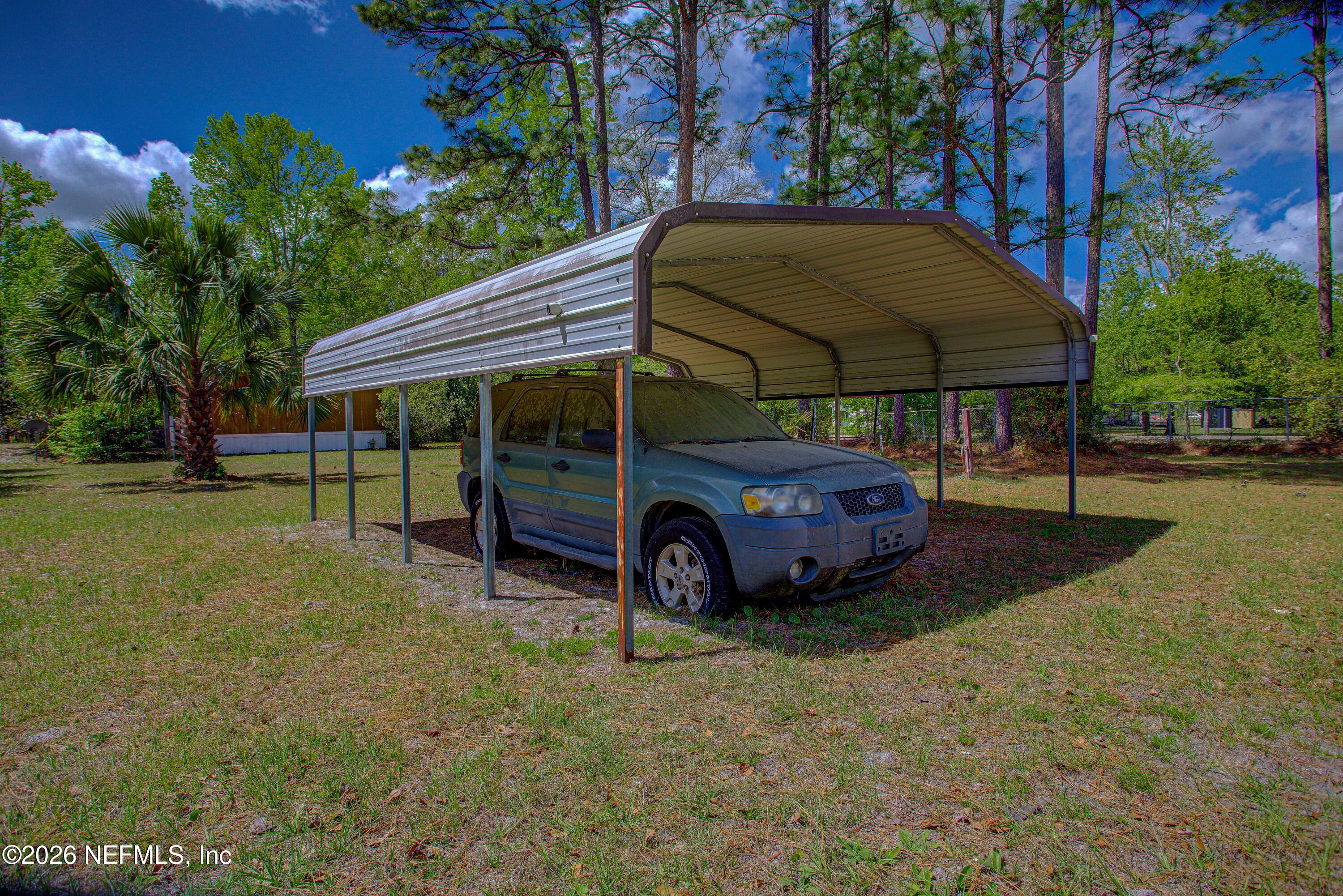 28050 Roundup Place Hilliard, FL 32046 - Photo 39 of 43 20260402-28050_Roundup_Pl-70