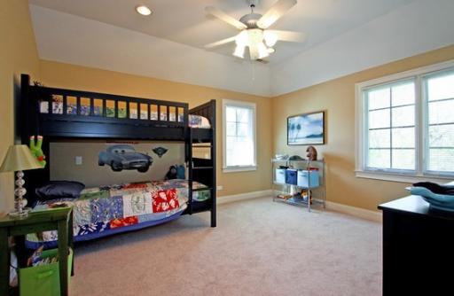 2360 Greenview Road Northbrook, IL 60062 - Photo 10 of 12 a bedroom with a bed and a tv on the dresser