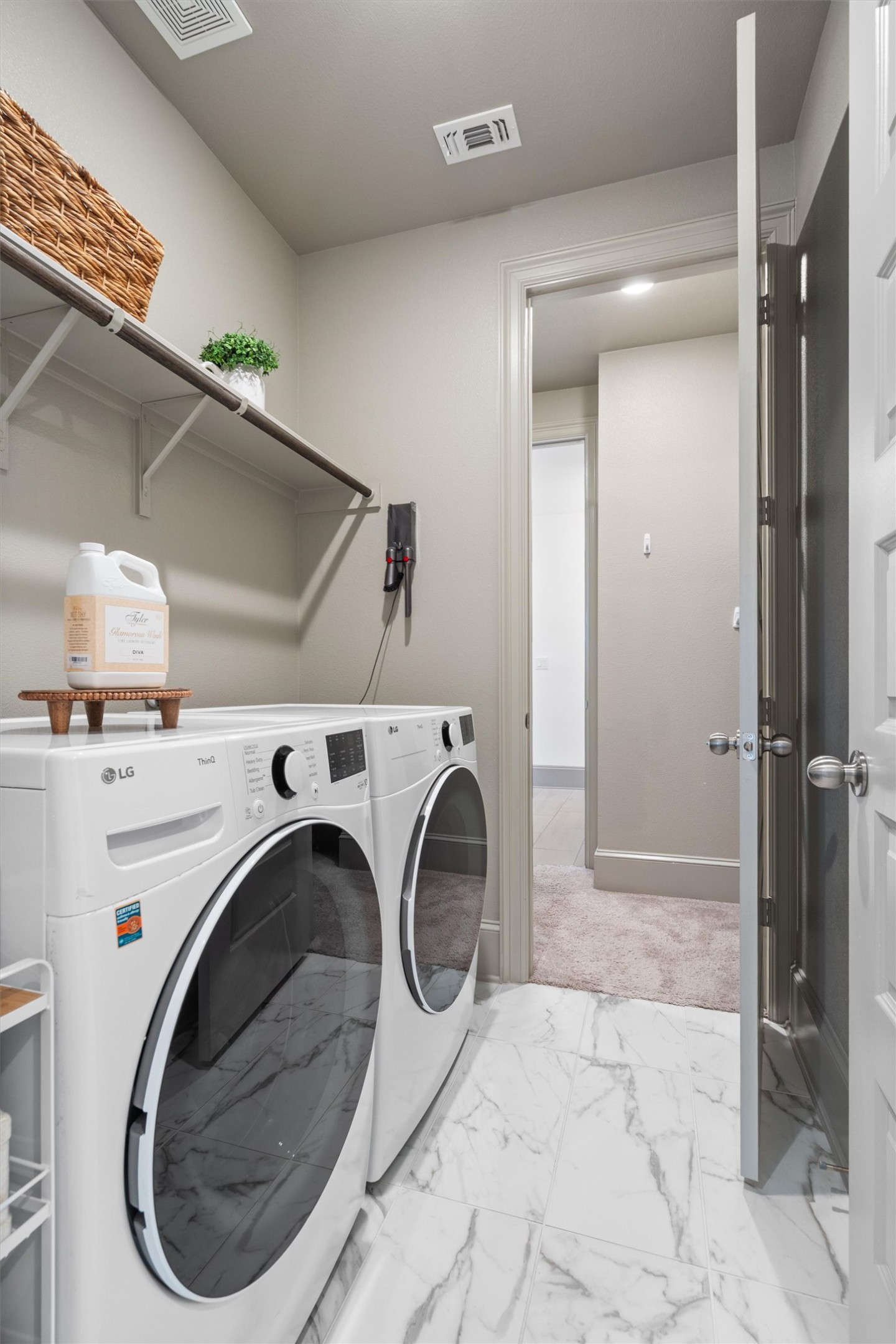 209 Rio Ranchero Road Georgetown, TX 78628 - Photo 21 of 37 Laundry room that leads to primary closet