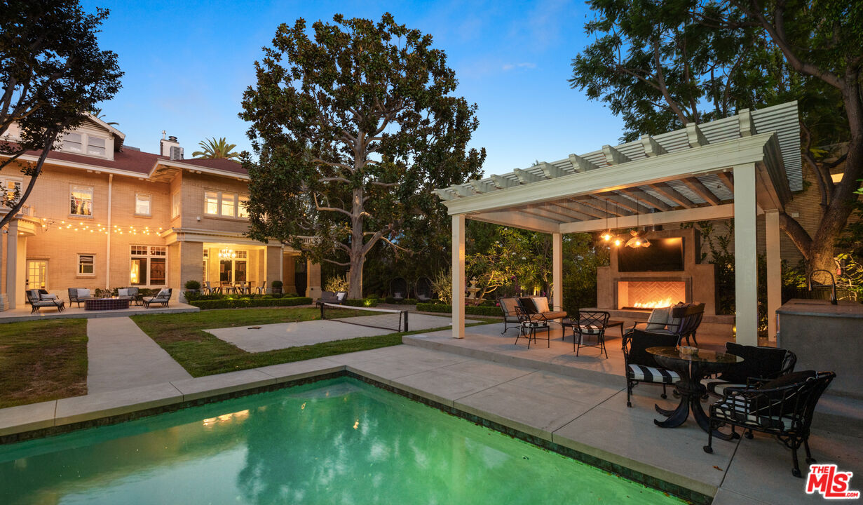 601 South Windsor Boulevard Los Angeles, CA 90005 - Photo 11 of 48 a view of a house with backyard porch and sitting area