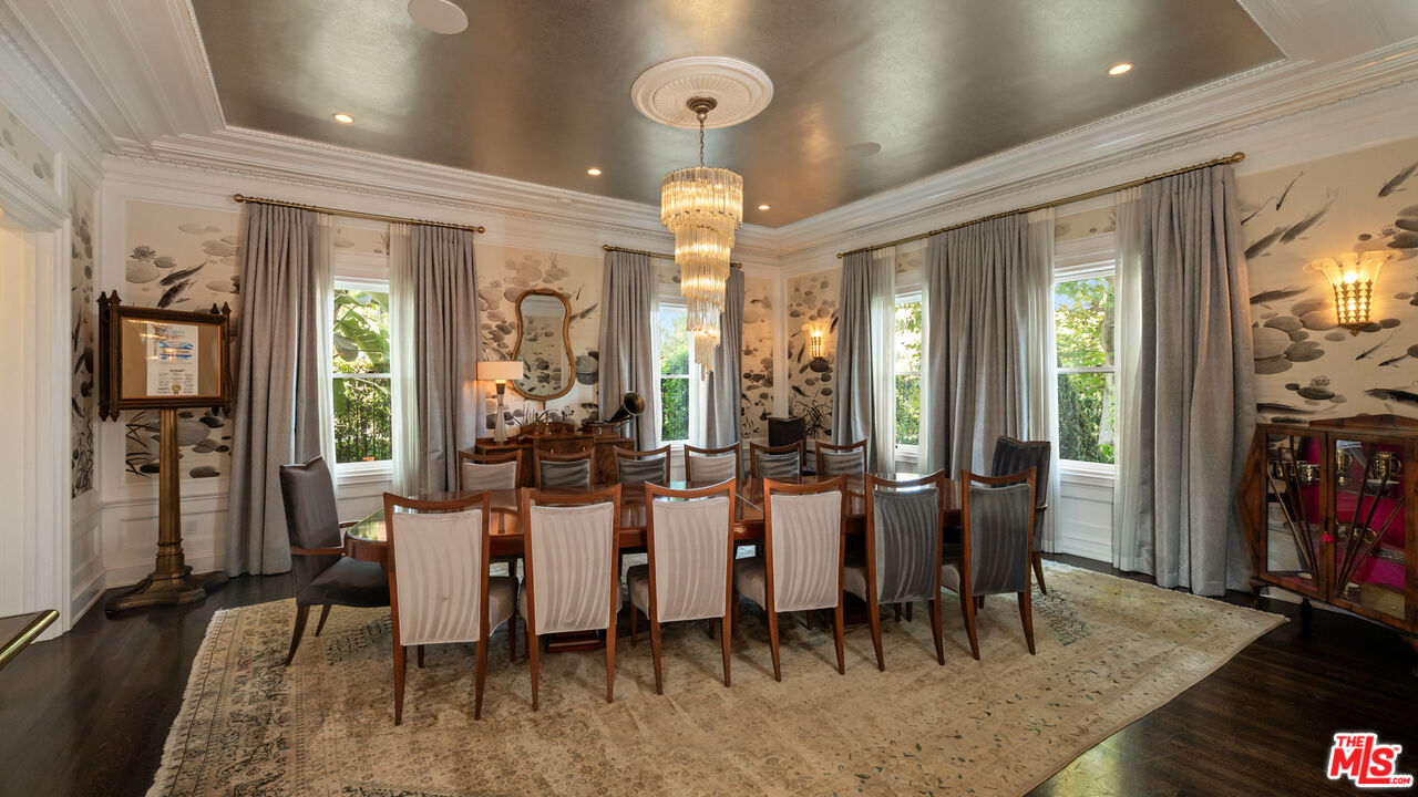 601 South Windsor Boulevard Los Angeles, CA 90005 - Photo 16 of 48 a view of a dining room with furniture window and wooden floor