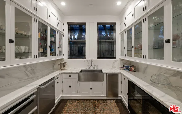 a view of an oven and sink