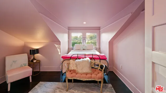 a view of a dining room with furniture and window