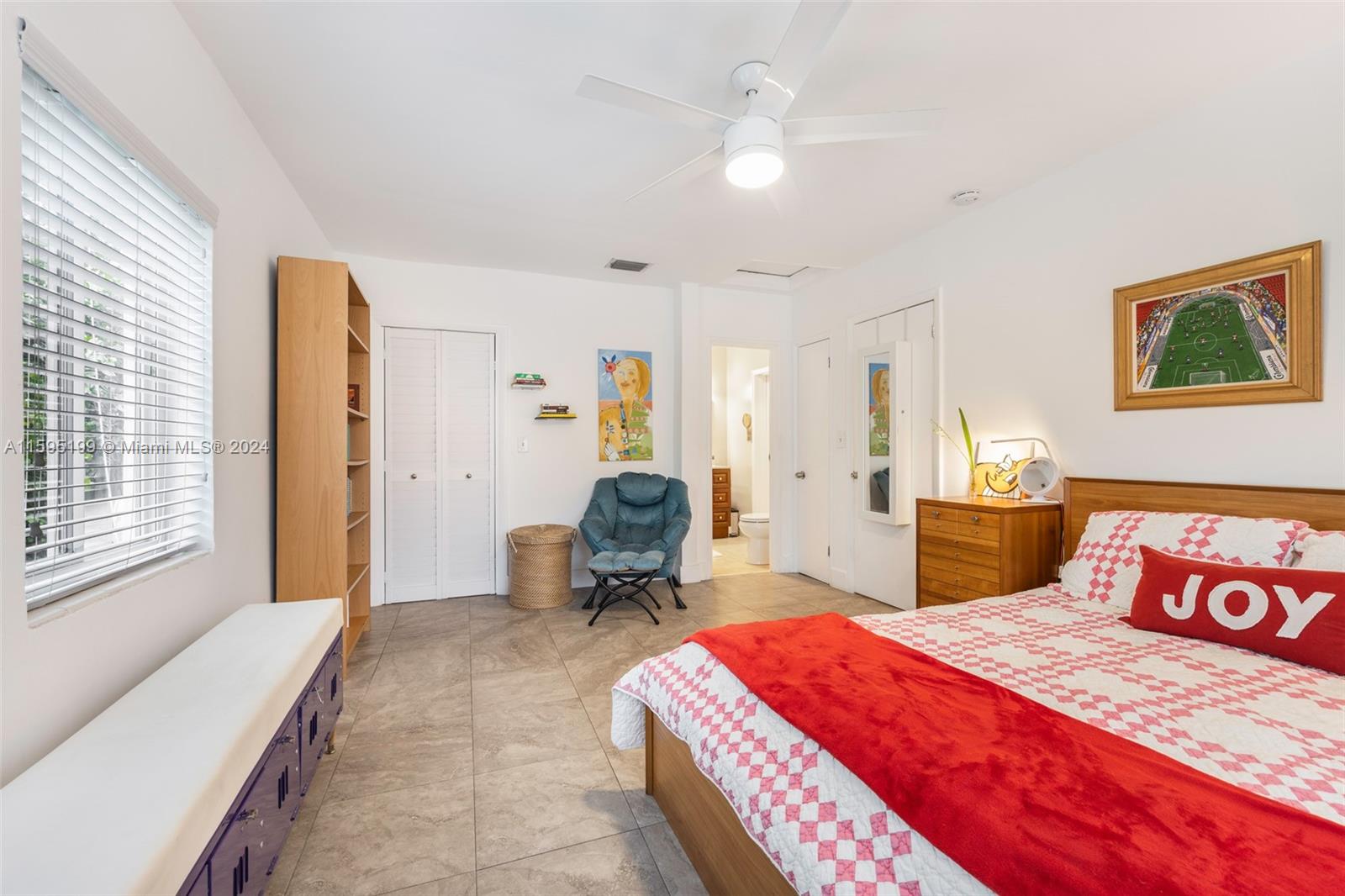 4420 Northwest 3rd Avenue Miami, FL 33127 - Photo 19 of 36 a bedroom with a bed and wooden floor