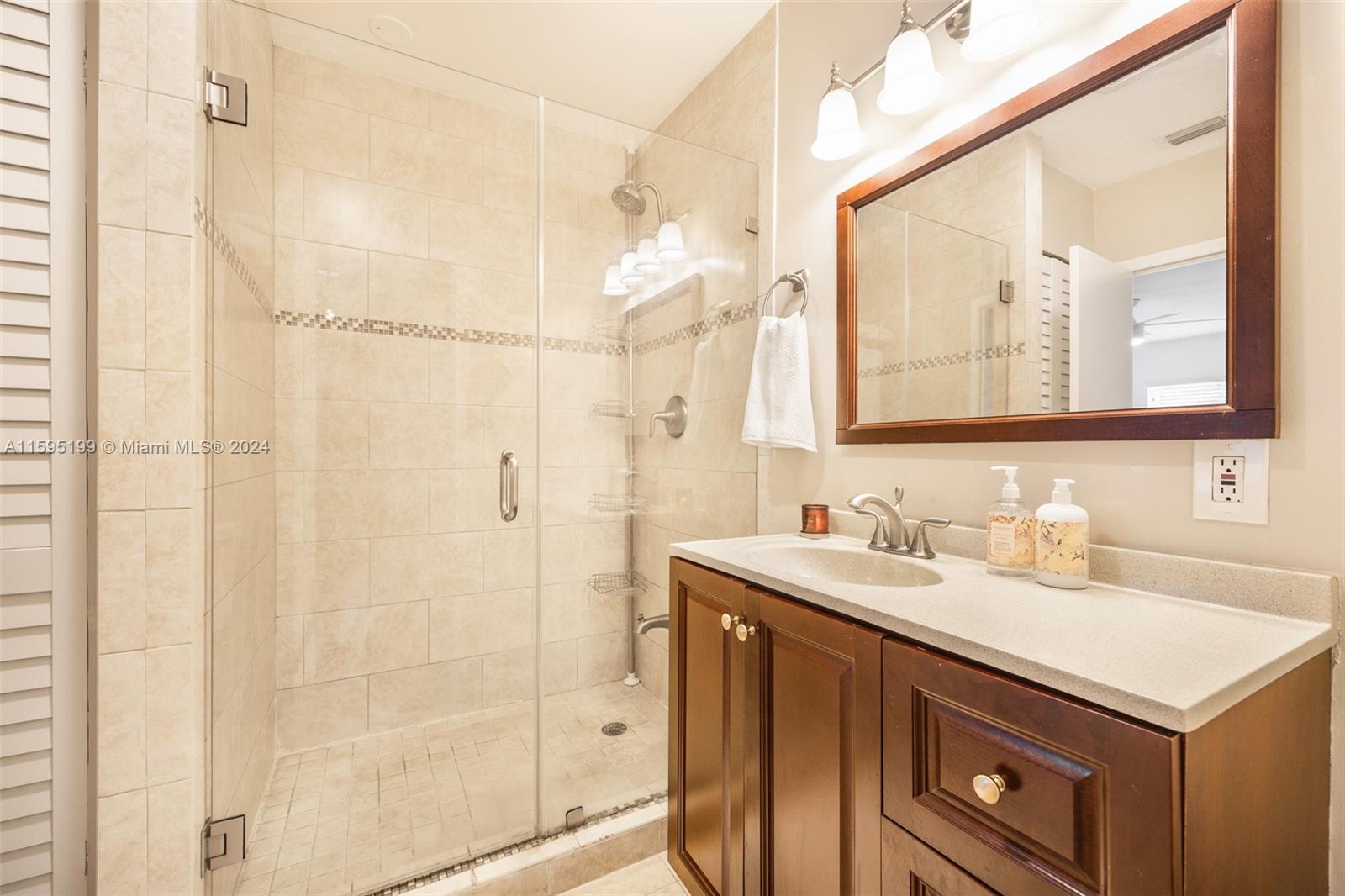 4420 Northwest 3rd Avenue Miami, FL 33127 - Photo 20 of 36 a bathroom with a sink and a mirror