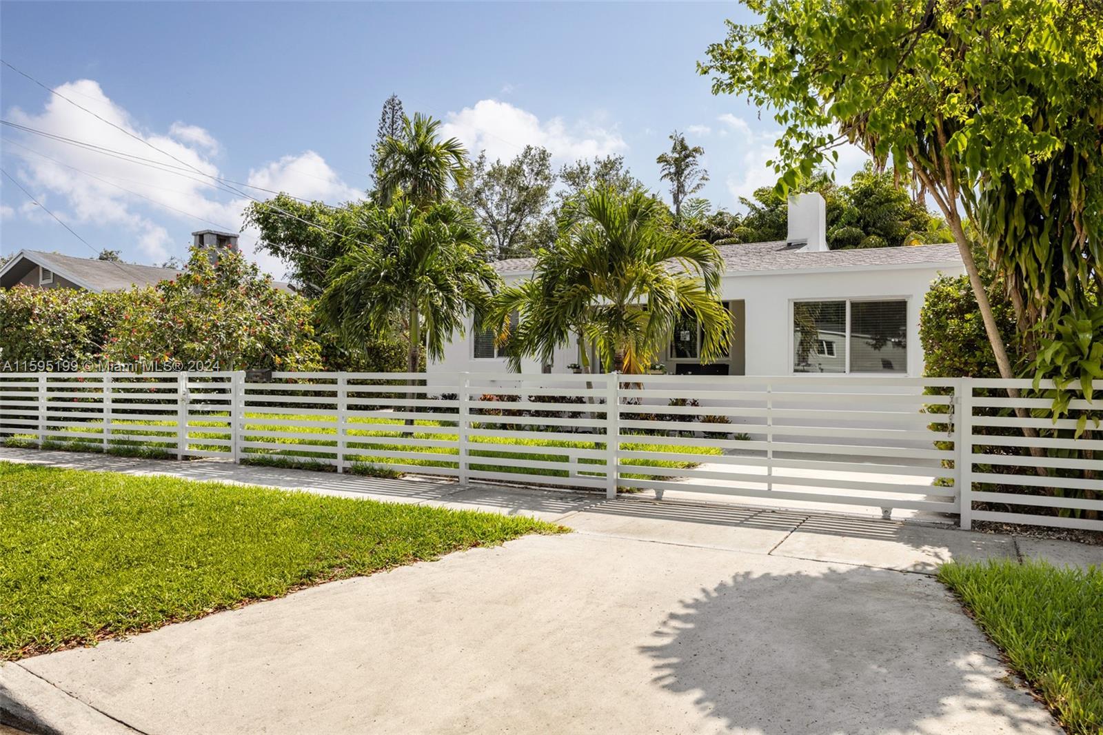 4420 Northwest 3rd Avenue Miami, FL 33127 - Photo 2 of 36 a view of a house with a swimming pool